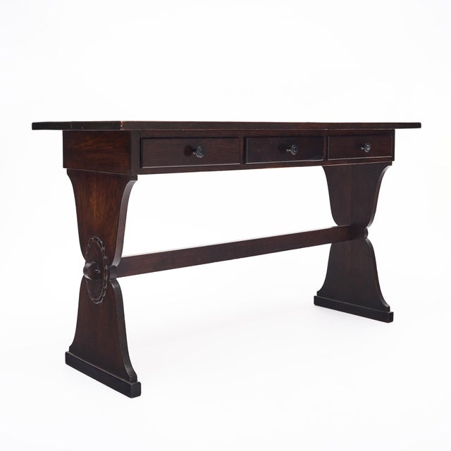 Console table from the Piedmont region of Italy made of chestnut wood. This piece has been finished with a wax polish....