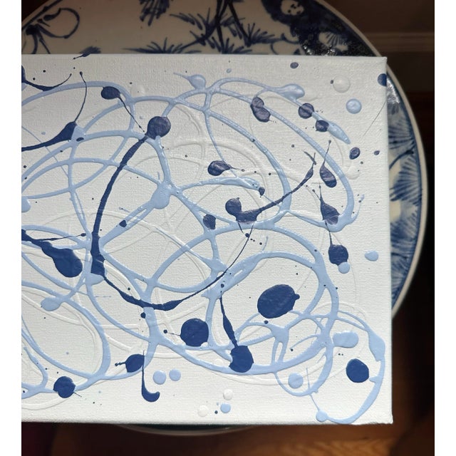 Original abstract, acrylic on canvas. Light blue with navy and cornflower swirls. Raised elements create 3D aspects in...