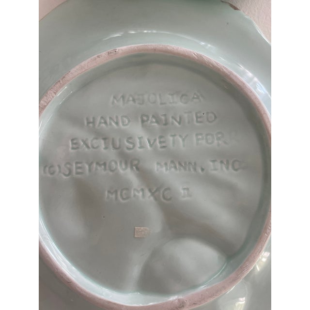 2 decorative wall plates >MAJOLICA DONE IN AQUA WITH GREEN FLOWER,BROWN EDGING