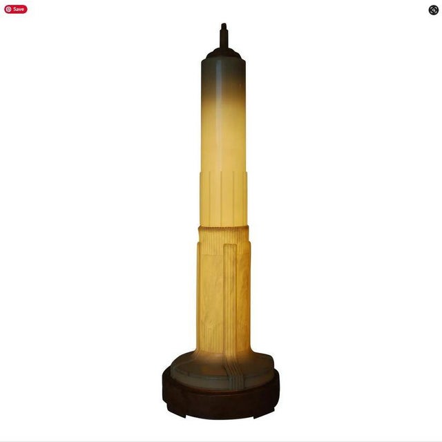 Striking and sculptural celluloid Art Deco fluorescent table lamp modeled after the iconic silhouette of the Empire State...
