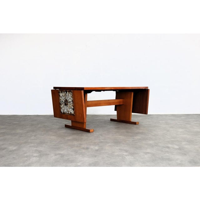 Vintage Extendable Dining Table, 1960s, in Good conditions. Designed 1960 to 1969 This piece is attributed to the...