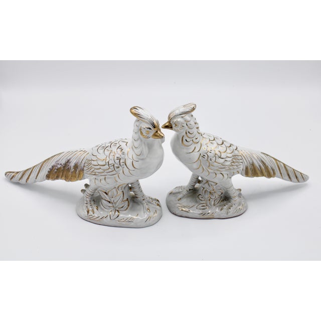 A stunning pair of vintage Italian terracotta pheasants, circa 1970s. This is a lovely duo in a lustrous white with gold...