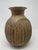 beautiful, mid- century hand made ceramic vase with intricate carvings