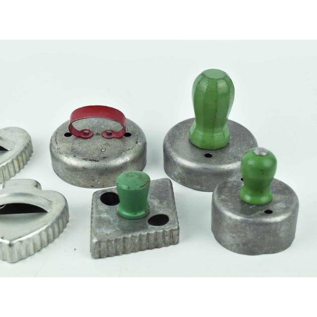 This charming 9-piece set of vintage kitchen tools brings a touch of mid-century nostalgia to any modern bakery. The...