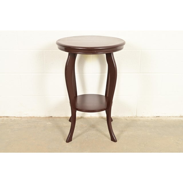 A beautiful antique Victorian or French Regency carved mahogany parlor table or side table In the manner of Berkey & Gay...