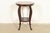 A beautiful antique Victorian or French Regency carved mahogany parlor table or side table In the manner of Berkey & Gay...