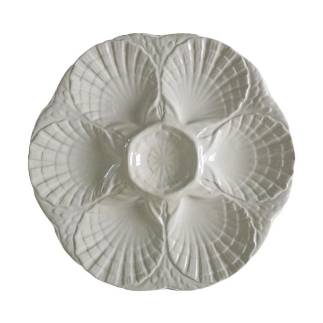 Bring timeless French charm to your table with this elegant set of four vintage Sarreguemines majolica seafood plates....