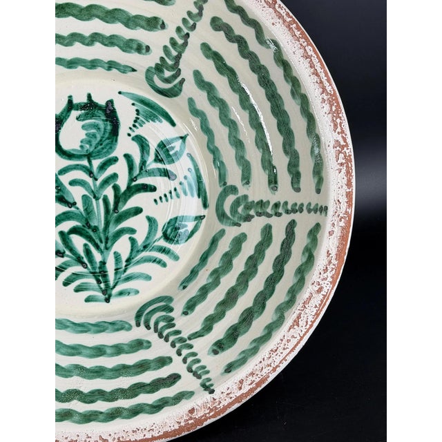 Large Spanish handmade and painted white and green glazed terracotta "Lebrillo" earthenware bowl in the style typical of...