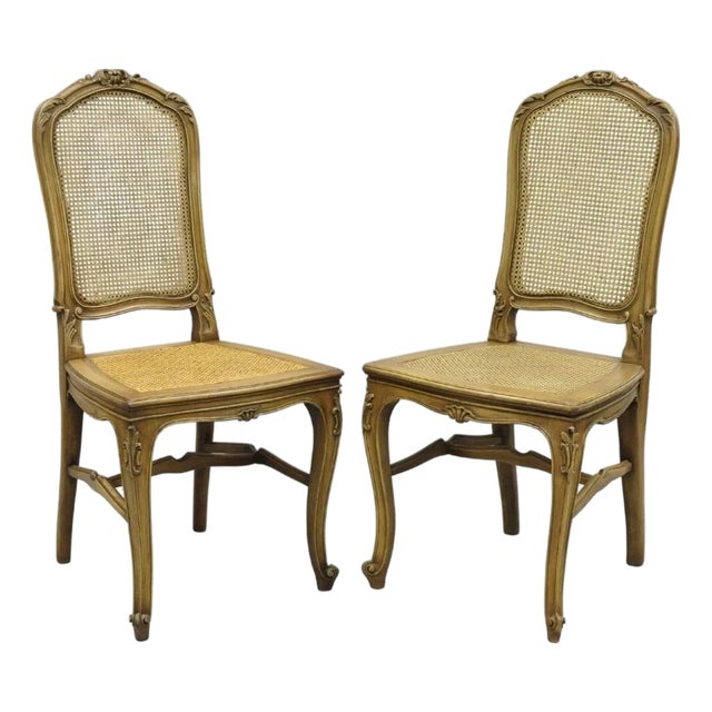 Antique French Provincial Louis XV Style Carved Walnut Cane Side Chair - A Pair For Sale