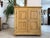 Dreamy Biedermeier vertico/cabinet made of spruce wood. Dimensions: Height x Width x Depth 125 x 120 x 45 cm. For sale is...