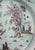 Early 18th century manganese tin glazed ceramic Delft charger. Hand-painted traditional Chinoiserie scene featuring a...