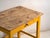 This antique painted kitchen table in pine wood is a rustic table with a drawer, a pine top and a painted base, on square-...