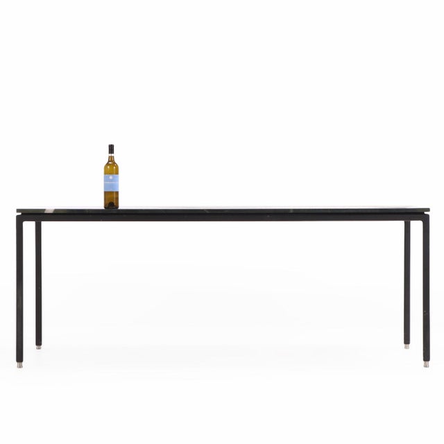Sensational contemporary metal dining table with breathtaking "avocatus quartzite leathered" stone top. Quartzite is a...
