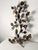 Large four-light wall lamp in decorated wrought iron, 1960 Good condition. 14 lamps Height 107 cm Width 65 cm Depth 15 cm...