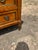 Elegant 19th-century Louis XVI style commode featuring a beautifully figured wood veneer with classic neoclassical lines....