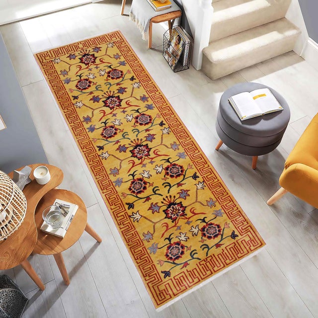 Enhance your home with this exquisite hand-knotted Super Kazak rug, crafted from fine hand-spun wool and dyed with all-...