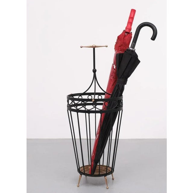 Love this 1950s Umbrella stand, black round metal base, comes with solid brass handle feet and details. Superb quality and...