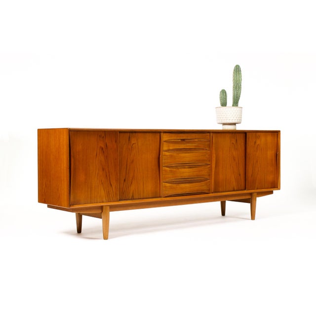 #2021— Danish modern / Mid Century Teak Credenza / Sideboard — Sliding Doors — Dyrlund Fantastic vintage specimen...