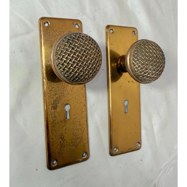Up for sale is a rare pair of antique gilt bronze microphone shaped door handles. The handles are made of bronze and have...