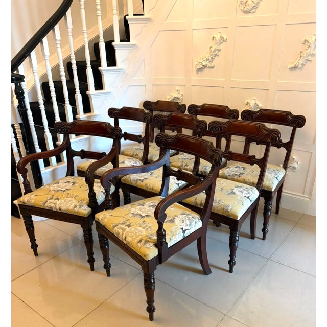 A fine antique Regency mahogany set of eight dining chairs, comprising six side chairs and two carver armchairs. Dating...