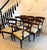 A fine antique Regency mahogany set of eight dining chairs, comprising six side chairs and two carver armchairs. Dating...