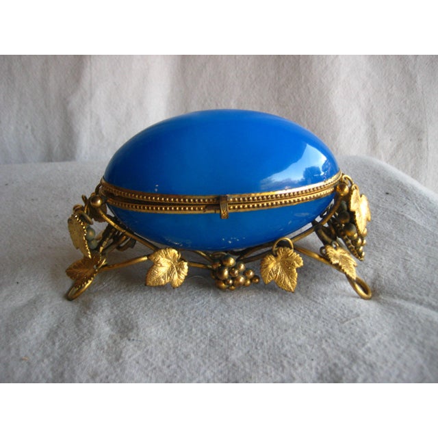 One of the best pieces we had for long time this large bleu opaline box in a shape of an egg is splendid , it contains...