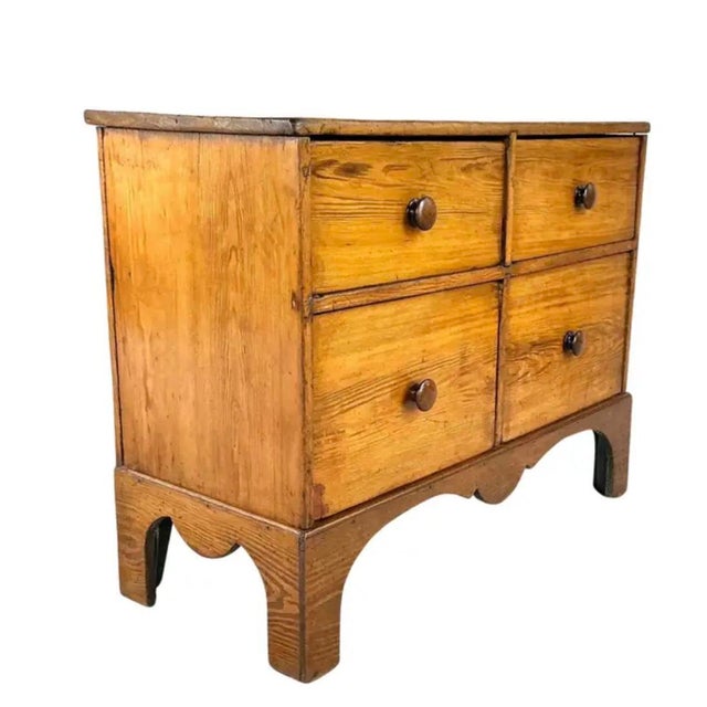 English Pine Chest of Drawers. This chest embodies the warmth, simplicity, and craftmanship associated with English...