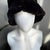 A refined vintage mink bucket hat from the 1990s, crafted in a softly structured silhouette that blends casual minimalism...