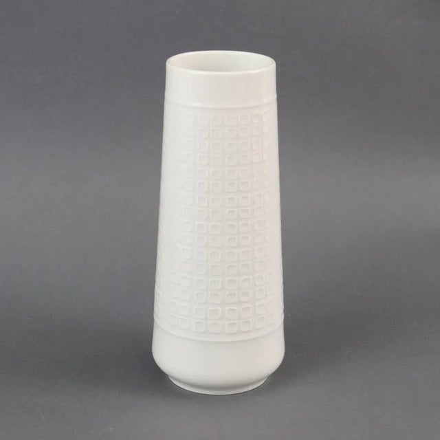 This vintage porcelain vase with op-art geometric pattern has a signature on the bottom with maker: Edelstein Bavaria and...