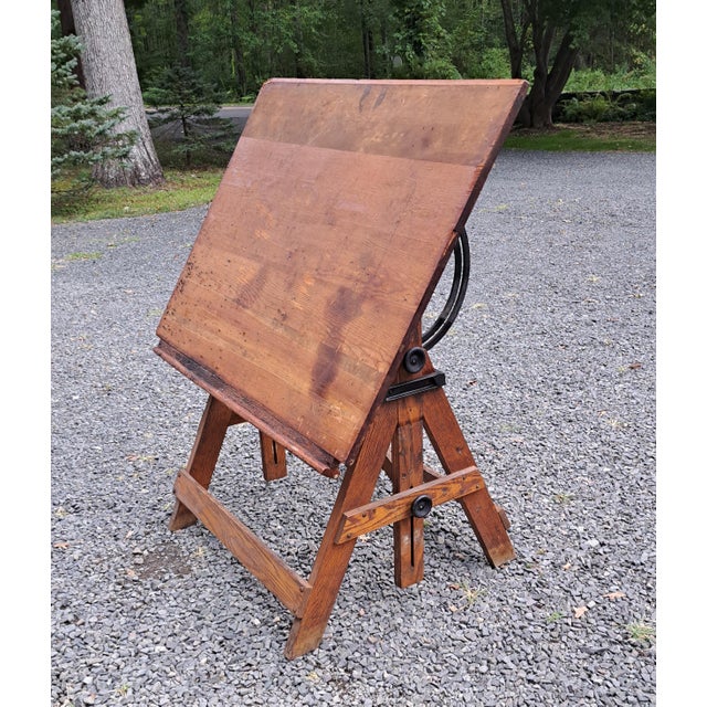 Antique Keuffel & Esser Popular Drafting Table. The top is 42" x 33" and it can raise from 35" to 42". Nice cast iron...