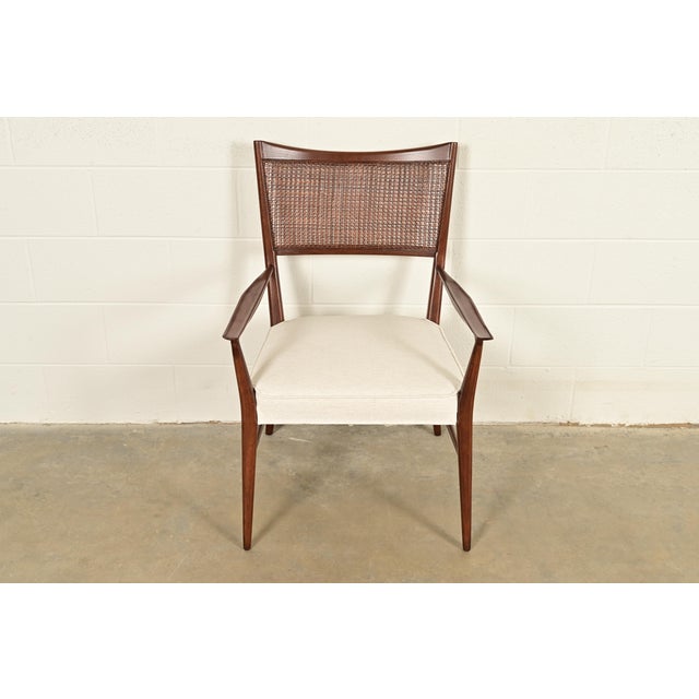 A gorgeous Mid-Century Modern armchair or dining captain chair By Paul McCobb for Directional and produced by Calvin...