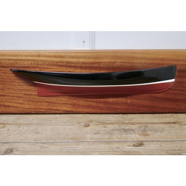 Mounted half block boat, ship builders/owner’s model. The half model was made in the 1960s and is mounted on mahogany...