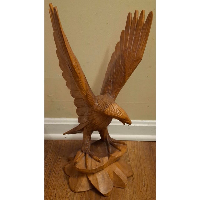 A mid 20th Century Handcrafted, Hand-Carved from a single piece of wood , Figure of an Bald American Eagle landing On Wood...