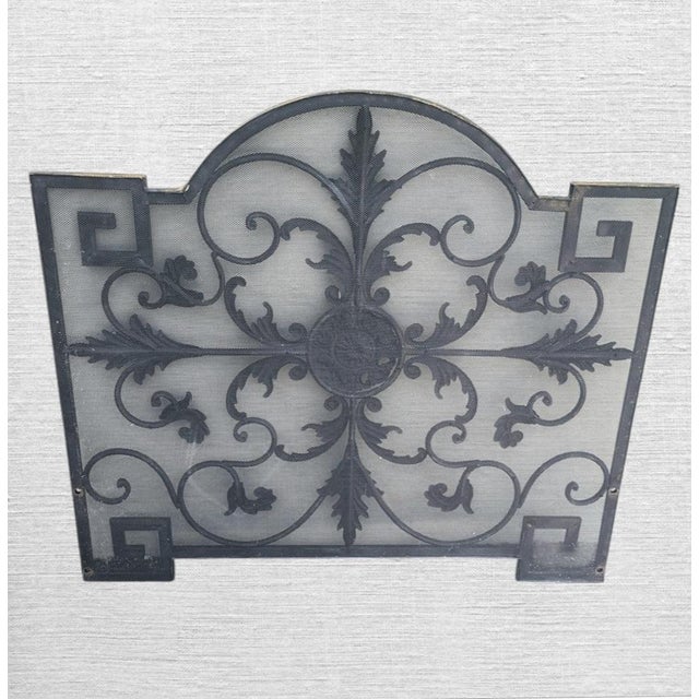 ​Elevate your hearth with this dramatic, Hollywood Regency-style single-panel fireplace screen. Crafted with an arched top...