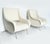 Pair of vintage Italian armchairs from the 1970s with original frames, brass feet and bouclé fabric upholstery....