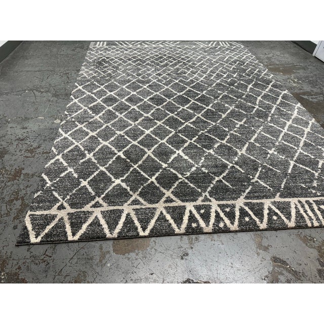 Design Plus Gallery presents the 7ft 8in x 10ft 7in Area Rug from Abbey Carpet & Floor. The area rug is a deep gray with...