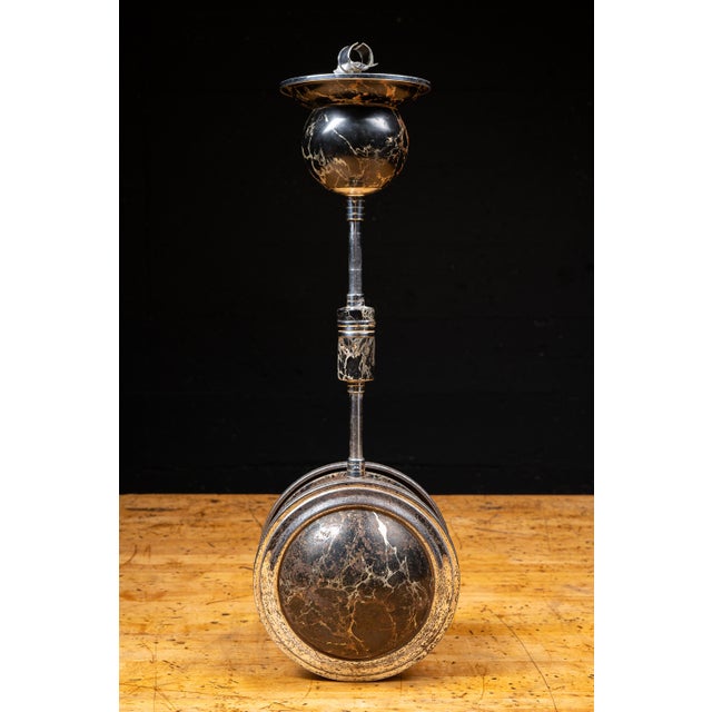 c. 1930s; Rollodor Manufacturing Co. - Los Angeles, CA Self-righting mobile floor ash tray manufactured by Rollodor...