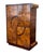 A striking pair of monumental Art Deco wardrobes, crafted in a bold combination of Macassar ebony, walnut, and mahogany...