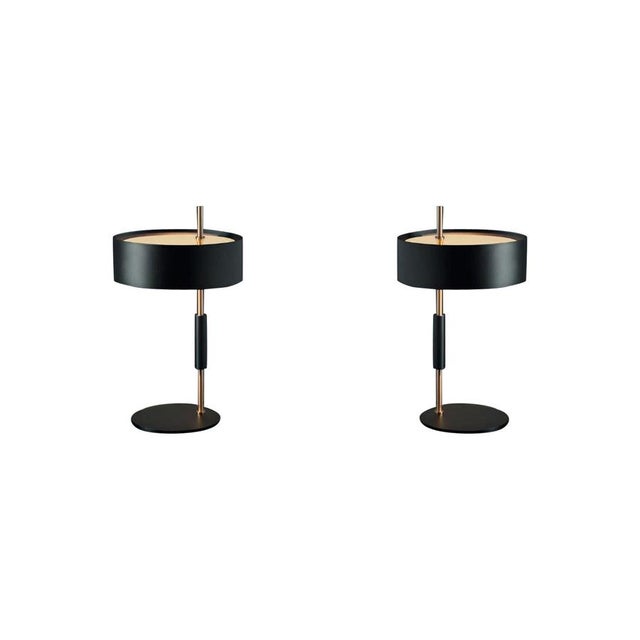 Set of two ostuni e forti 1953 table lamps by oluce, satin gold & black the lamp 1953 designed, by ostuni e forti, has two...