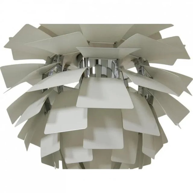 Poul Henningsen's iconic Artichoke lamp, designed in 1958, is here seen in a white version with a diameter of 48 cm. The...