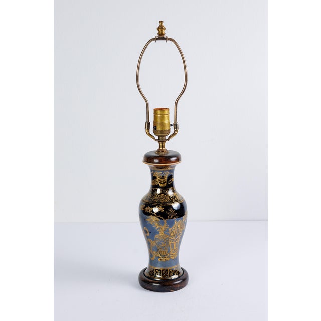 A rare and distinguished Chinese Export porcelain baluster vase lamp featuring an exquisite powder blue and black ground...