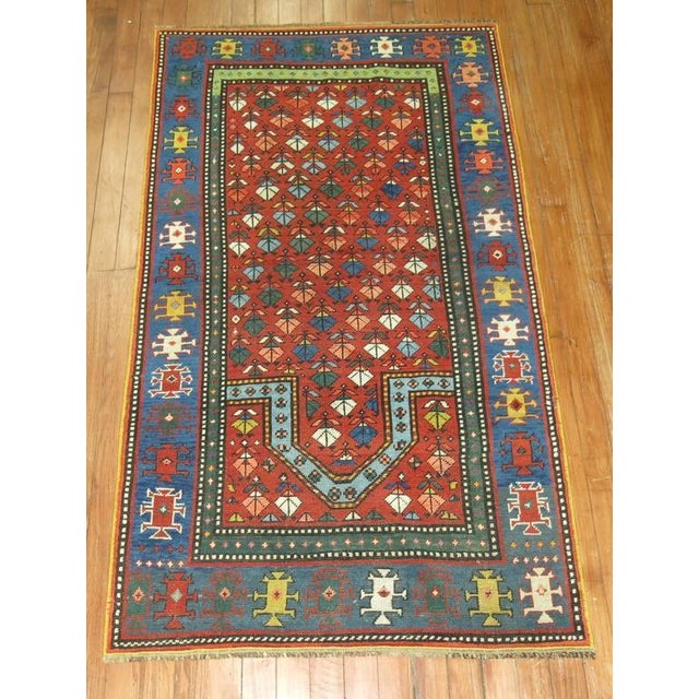 An early 20th century colorful Kazak prayer design rug. 2'9'' x 4'11'' The best antique Kazak rugs are long prized by...