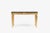 Scaled to impress, the Giselle console has a dark stone top with hand carved, gold gilded base, with many overlapping...