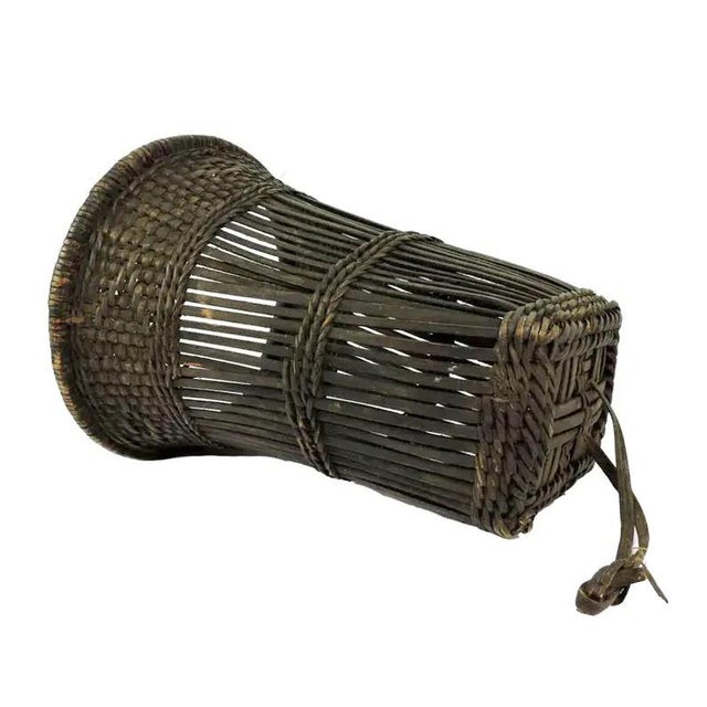 The Kuba handwoven basket is a testament to the artistry of the Kuba people in the Democratic Republic of Congo. Crafted...