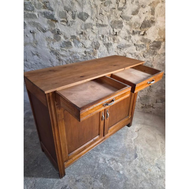 An old French sideboard dating from the period circa 1930–1950. Crafted from a combination of beech, poplar and pine, this...