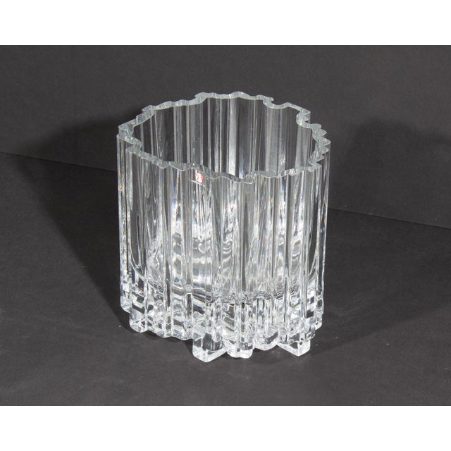 A 1970s "Arcadia" crystal vase designed by Finnish designer Tapio Wirkkala (1915-1985) for Iittala. Made in Finland, the...