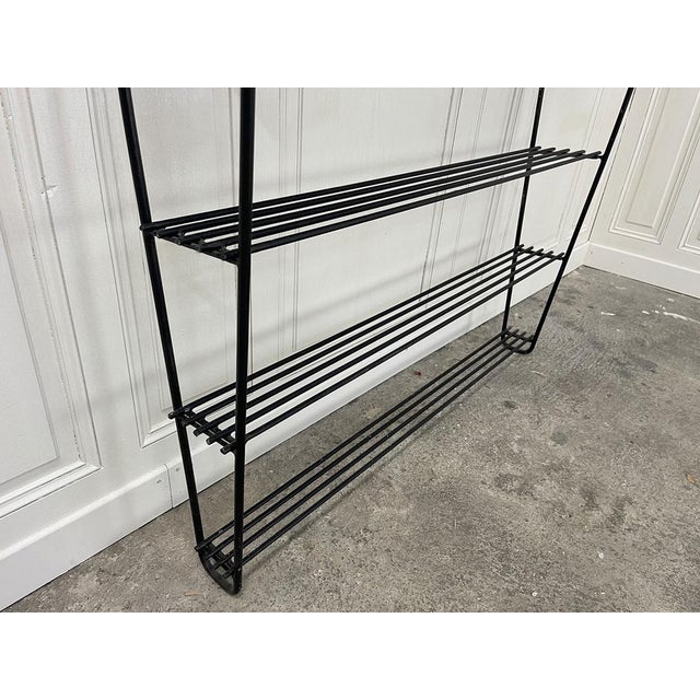 Metal and wood combine to give this vintage shelf all its charm! with its removable shelves, this 1970s shelf with graphic...