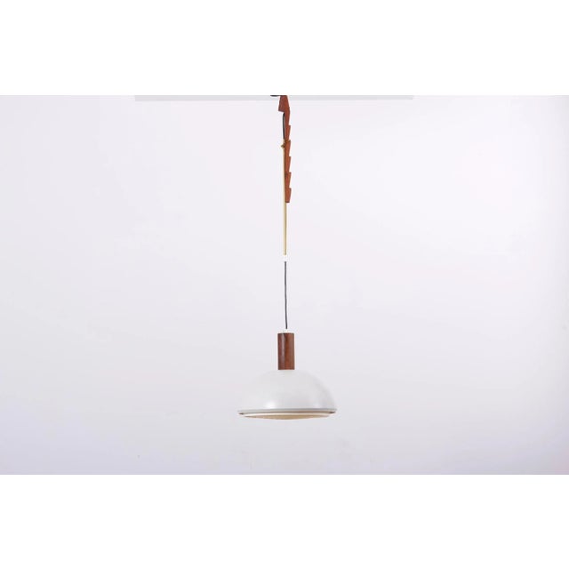 Height adjustable pendant lamp, designed by Svend Aage Holm Sørensen and manufactured by Holm Sørensen and Co in Denmark....