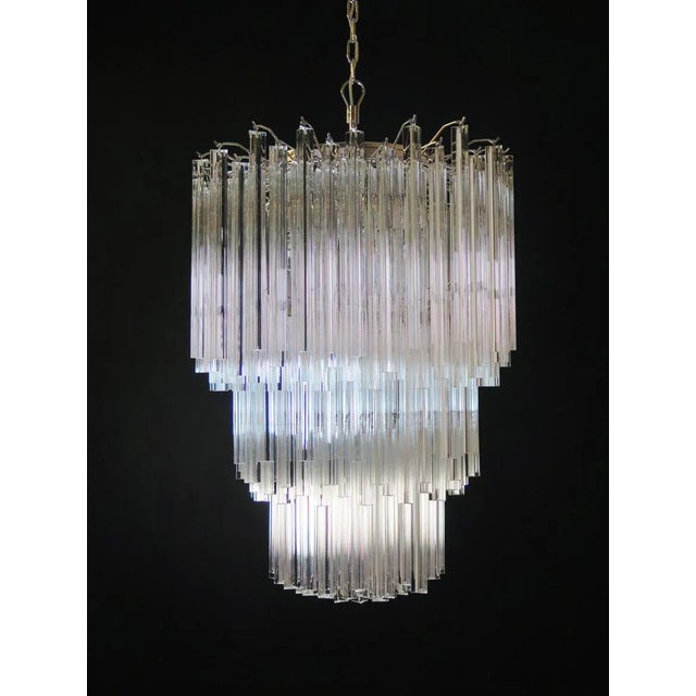 Fantastic vintage murano chandelier made by 187 murano transparent crystal prism in a nickel metal frame. The glasses have...