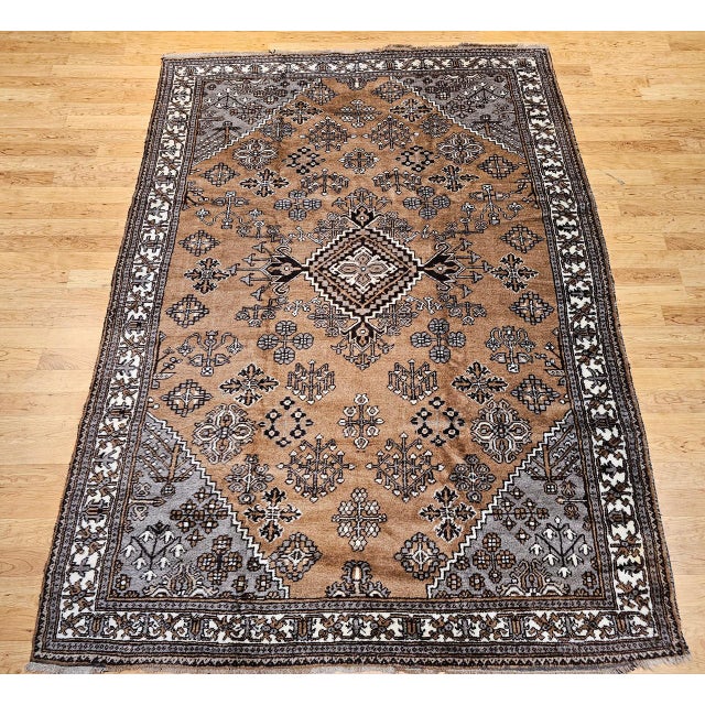 "Vintage Persian room size rug, handwoven in the first half of the 20th century by the Bakhtiari tribes of western Persia....